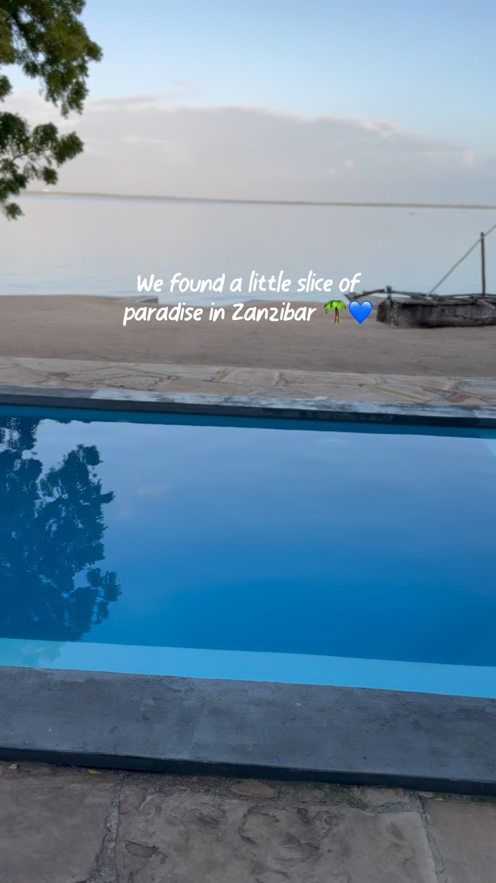 A 4BHK beachfront villa in Zanzibar for just ₹3,442 per family per night?! 😍🌴🏠 Here’s what our stay was like!📍 Fukuchani Beach, on Zanzibar’s northwest coast, near Nungwi beach🏡 4 BHK villa, right by the beach with a kicthen-cum-living room opening to the beach, infinity pool overlooking the sea!🏖️ Almost private beach by a mangrove forest, as no other hotel/airbnb on this beach/village👵 Hosted by Mags, a lovely elderly woman. She is a great cook! 🥣🍳 Home-cooked breakfast - tea, coffee, cereals, toast, butter, jam, eggs, and caramelized onions with tomatoes🍽️ She cooked dinner for us as well - burgers, grilled fish, Swahili-style fish curry with rice, grilled tiger prawns, etc.✅ Complimentary inclusion: 2 kayaks, life jackets, snorkelling gear, and a private sunset dhow cruise⭐ Starfish Beach nearby; additional payment required for boat ride✨🔭🌌 The night sky is perfect for stargazing💰 Cost: Paid ₹55,068 for the entire villa (4BHK) for 4 nights. As we were a group of 4 families, it was ~ ₹ 3,442 per family per night.🍝 Food during stay: Food (4 breakfasts, 4 dinners) for 8 people: ₹38,717 🍷 In-house drinks for 8: ₹8,980➡️ Total food & drinks cost pp per day: < ~₹1500⚠️ These costs are from August 2024⚠️ This is not the entire food and drinks cost in Zanzibar✨ Share with your travel buddy!Follow @mytrave for more travel recommendations.#mytravellingstilettos@tanzania_unforgettable@zanzibartourismindia@zanzibar_tourism#visitzanzibar #greenzanzibar #visittanzania #tanzaniaunforgettable[ Africa vacation, holidays, international trip from India, island vacation, budget itinerary, couple holiday, african vacation, zanzibar, beautiful airbnb, luxury stays, hotel recos]