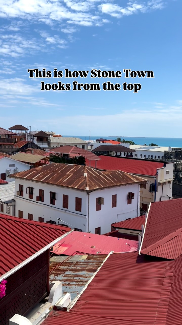 Stonetown, capital of Zanzibar is beautiful. Oranges roofed houses on the back drop of blue ocean looks stunning.#mytravellingstilettos@tanzania_unforgettable @zanzibartourismindia @zanzibar_tourism#visitzanzibar #greenzanzibar #visittanzania #tanzaniaunforgettable[ beach holiday, Africa vacation, Zanzibar, African beaches, viral trending reel, Tanzania stories, things to do in Tanzania places to visit in Zanzibar]