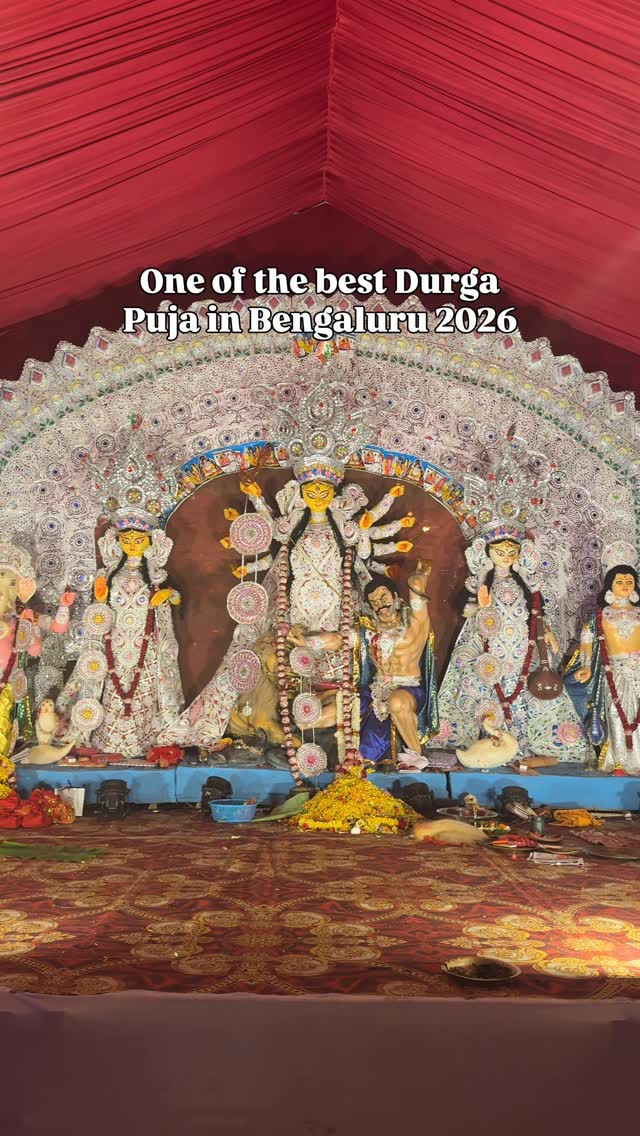 Follow @mytravellingstilettos 👠 for more such recommendationsOne of the top Durga Puja in Bangalore 2026➡️ Jagriti Bangiyo Cultural Association (JBCA)📍 ITI Ground, beside Hanging Bridge, KR Puram, Bangalore🅿️ Huge and well managed parking spot - 100 rs⚠️ May get crowded in peak hours💯 We love this pujo. We visit it every time, pray, and eat delicious Bengali food. Overall, definitely worth the visit.🌯🛍️ Bengali food stalls, pop up shops available⚠️ In case you are interested, a list of 70+ Durga Puja pandals in Bangalore is in the bio!#mytravellingstilettos#durgapujainbangalore [durga puja in Bengaluru, Bangalore Durga puja pandal hopping, Bengalis in Bangalore, best Durga Puja in Bengaluru, theme pujo Bangalore,  Durga puja]